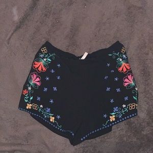 Black shorts with floral design